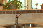 ceramic tile above kitchen sink